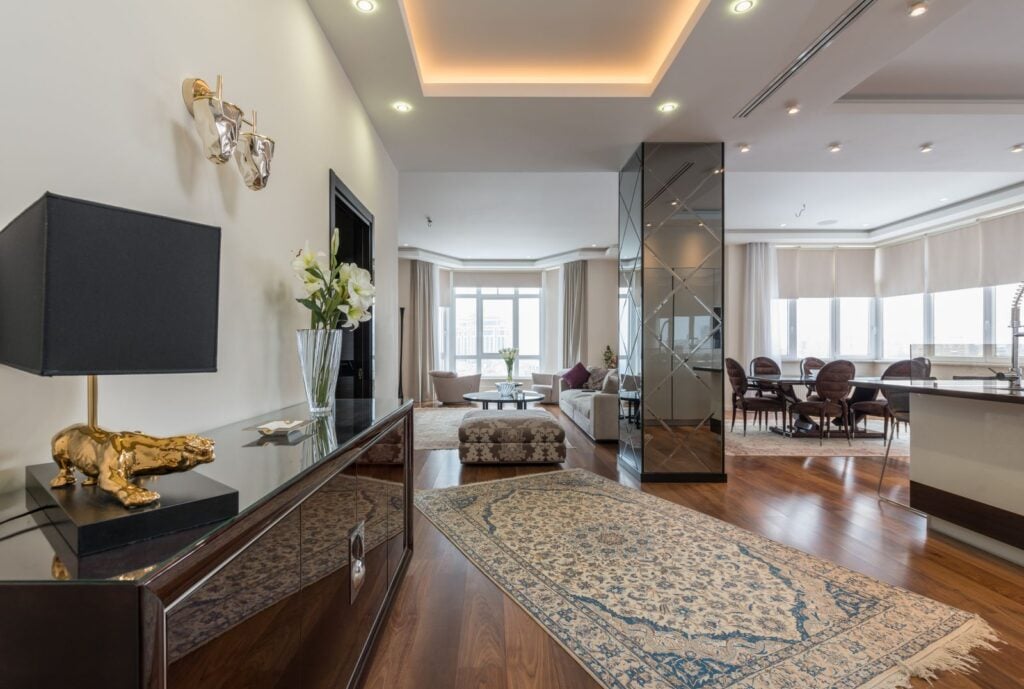 Light-filled living and dining rooms with clean wood floors